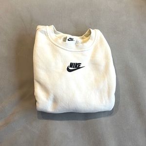 Cream Nike sweatshirt with black lettering